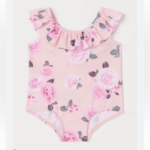 Ruffle trim girl bathing suit